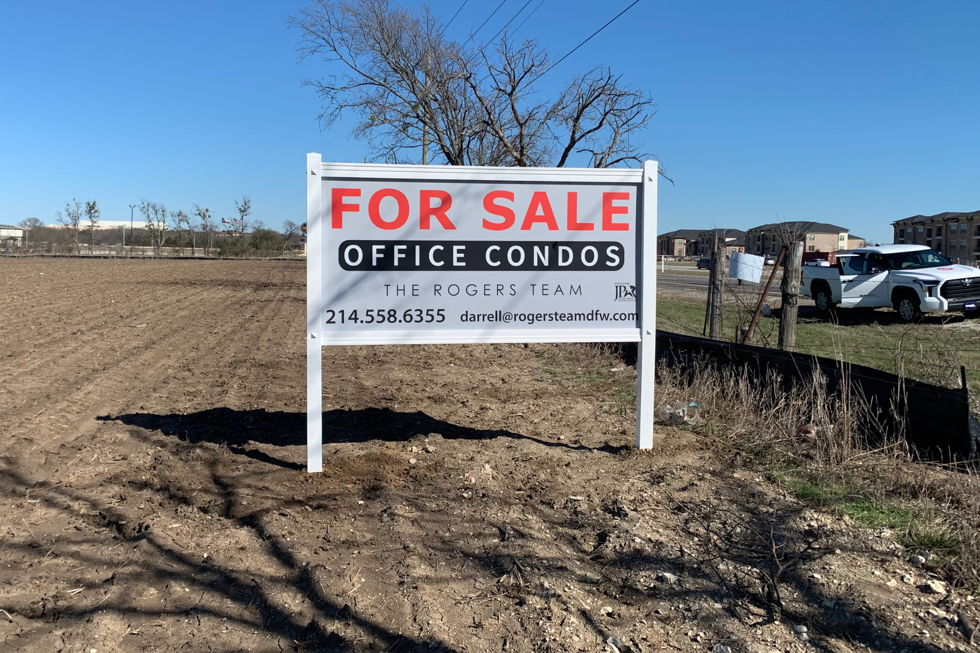 post and panel sign showing for sale
