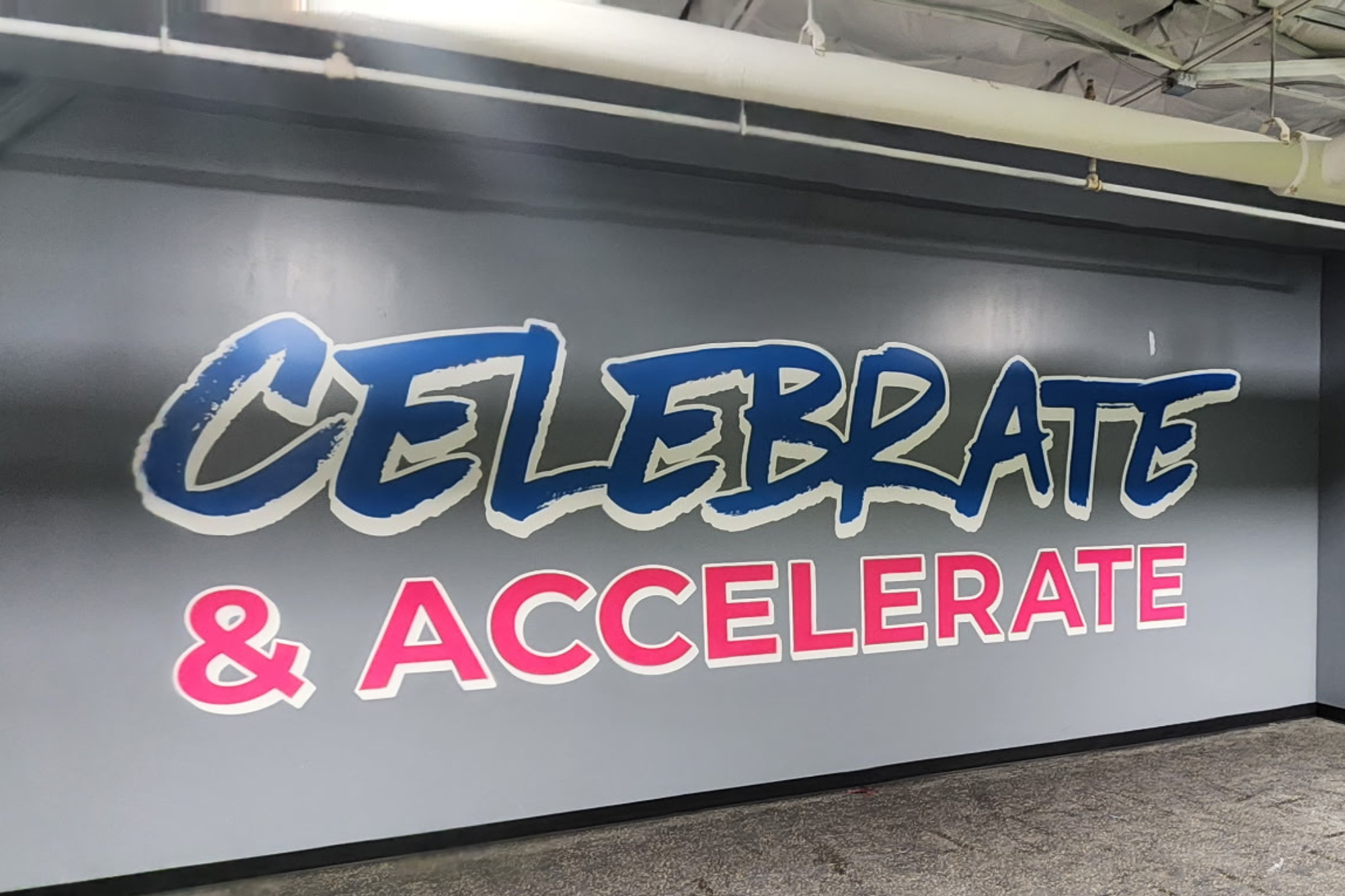 Slick City Wall Mural installation for a play business